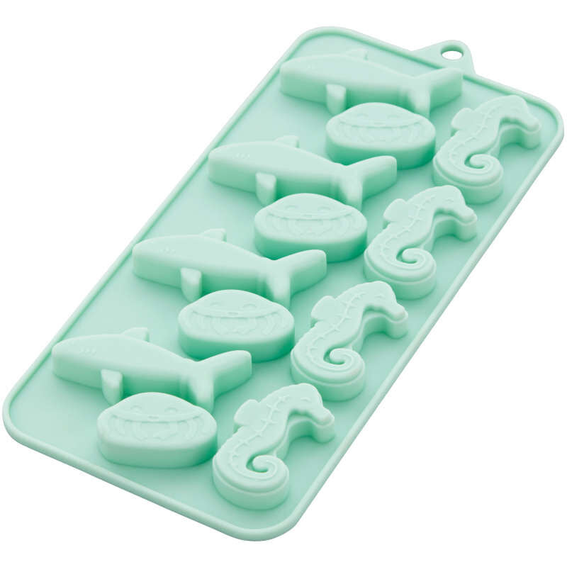 https://cakeandcandysupply.com/cdn/shop/products/2115-0-0233-Wilton-Shark-Jellyfish-and-Seahorse-Silicone-Candy-Mold-12-Cavity-M_1024x1024.jpg?v=1659298856