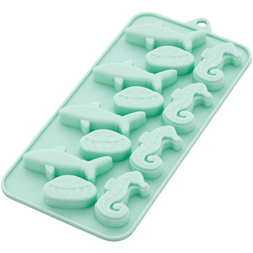 https://cakeandcandysupply.com/cdn/shop/products/2115-0-0233-Wilton-Shark-Jellyfish-and-Seahorse-Silicone-Candy-Mold-12-Cavity-M_512x512.jpg?v=1659298856